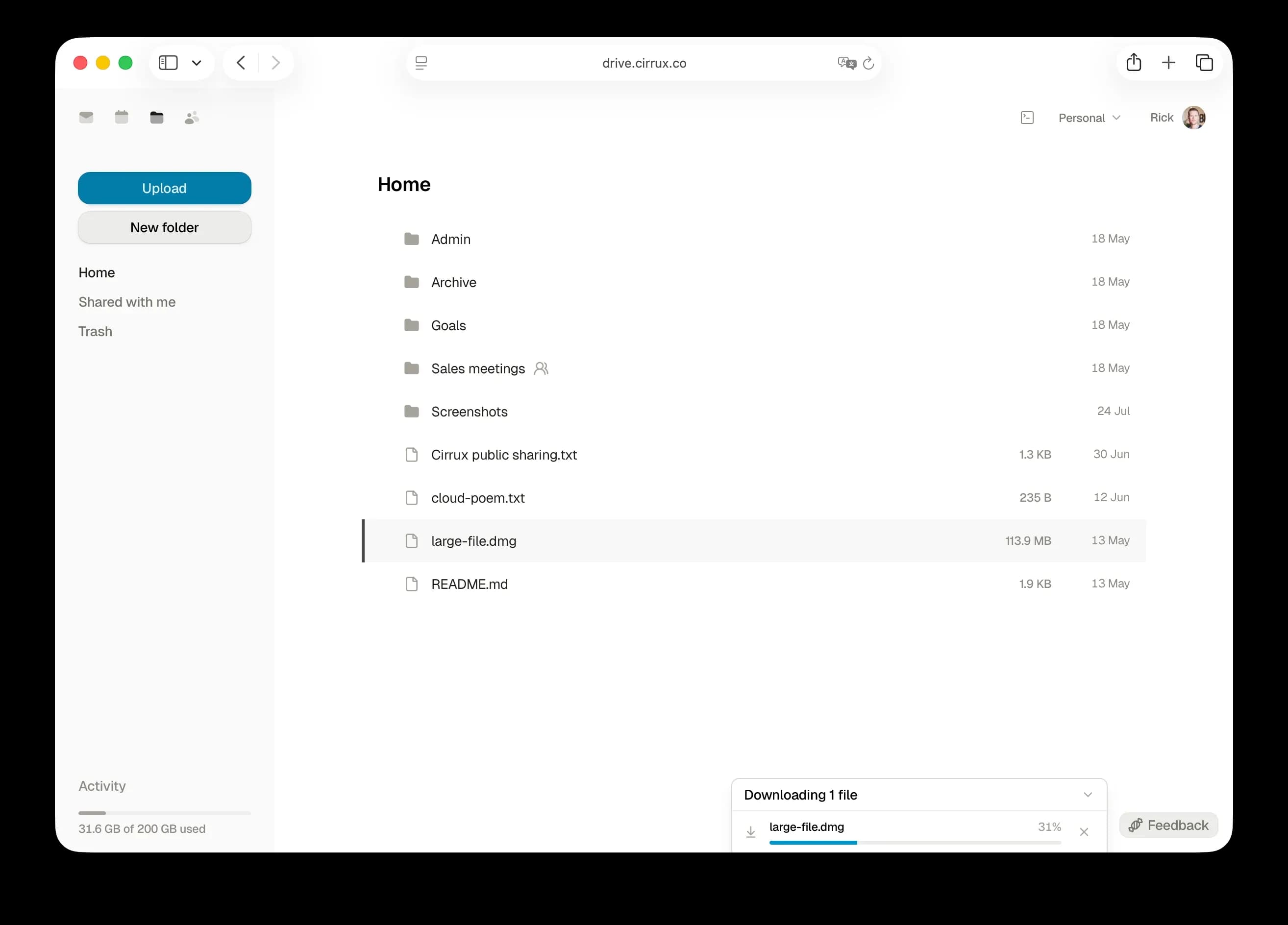 Cirrux Drive, showing a home folder of files and folders with a download in progress.